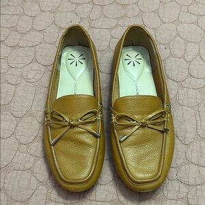 Isaac Mizrahi
Tan Leather Slip-On Loafers 
A few scuffs on toes and heel